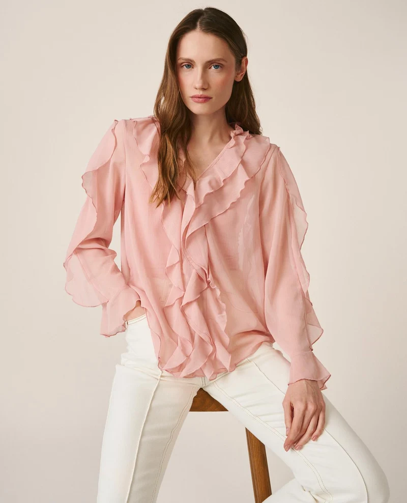 BLUSA CON VOLANTES