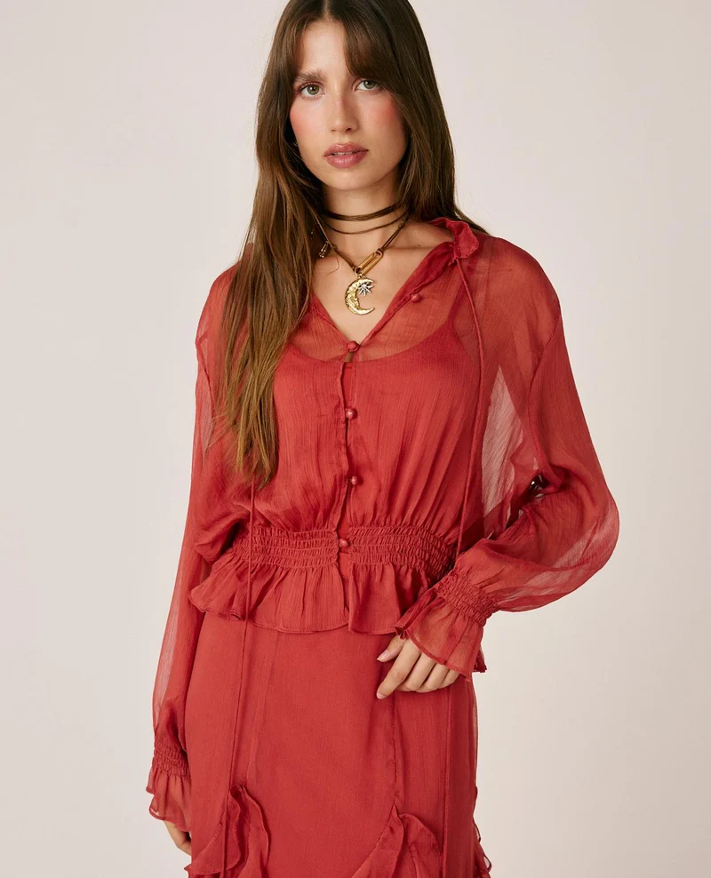 BLUSA DE GASA SEMITRANSPARENTE